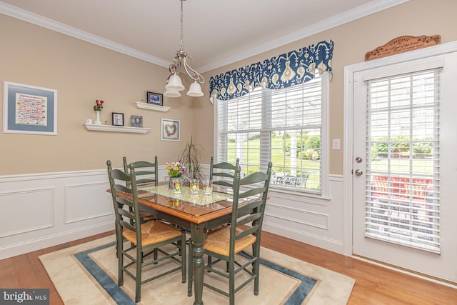 1 Chase Cir, Barto, PA 19504 - dining space featuring light wood-style flooring, ornamental molding, a wainscoted wall, and a decorative wall