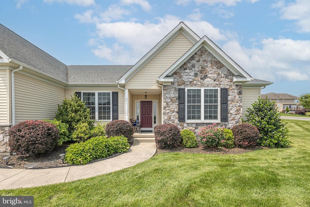 1 Chase Cir, Barto, PA 19504 - view of front of home with stone siding, a front lawn, and roof with shingles