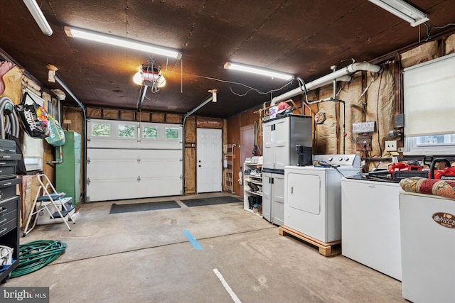 2465 Edgecomb Ave, Glenside, PA 19038 - garage featuring separate washer and dryer, a garage door opener, and refrigerator