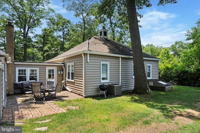 2465 Edgecomb Ave, Glenside, PA 19038 - rear view of house with a patio area, a lawn, and roof with shingles