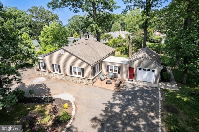 2465 Edgecomb Ave, Glenside, PA 19038 - view of front of property featuring driveway, an attached garage, and roof with shingles