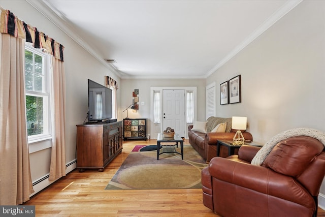 2465 Edgecomb Ave, Glenside, PA 19038 - living area featuring light wood-type flooring, ornamental molding, and baseboard heating