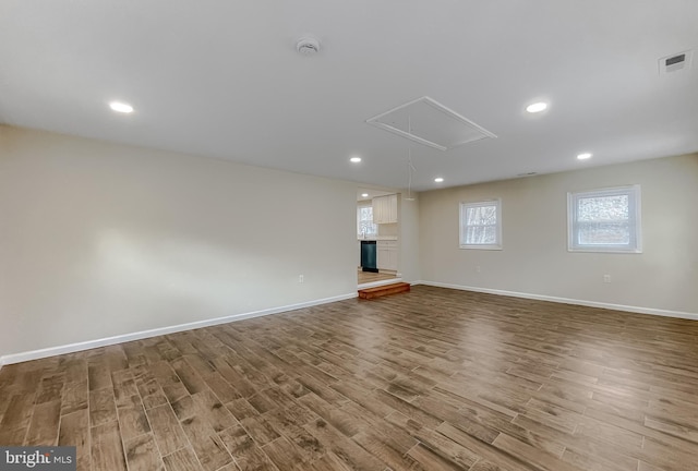 16000 Manning Rd W, Accokeek, MD 20607 - unfurnished living room with attic access, dark wood-style floors, and recessed lighting