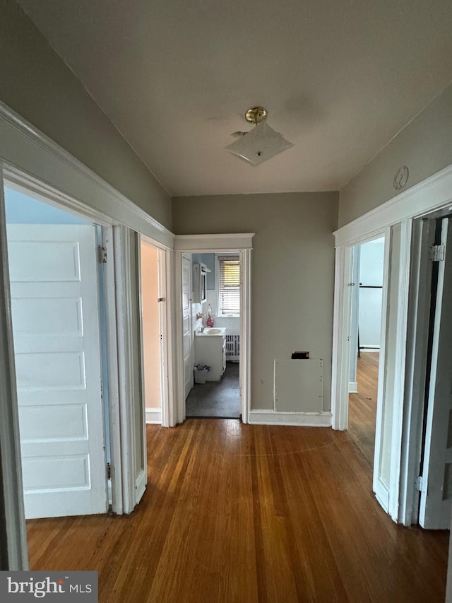 2004 N Jefferson St, Wilmington, DE 19802 - corridor featuring dark wood-style floors and baseboards