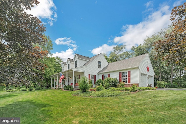 580 Buchanon Rd, Honey Brook, PA 19344 - view of front of house with a front lawn, a garage, covered porch, and roof with shingles