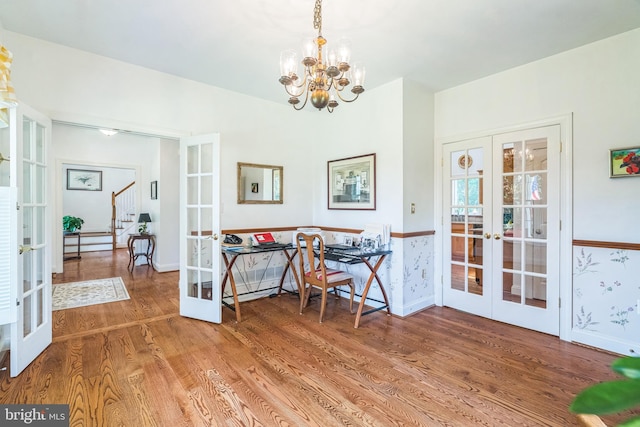 580 Buchanon Rd, Honey Brook, PA 19344 - dining room with french doors, wood finished floors, stairs, and a chandelier