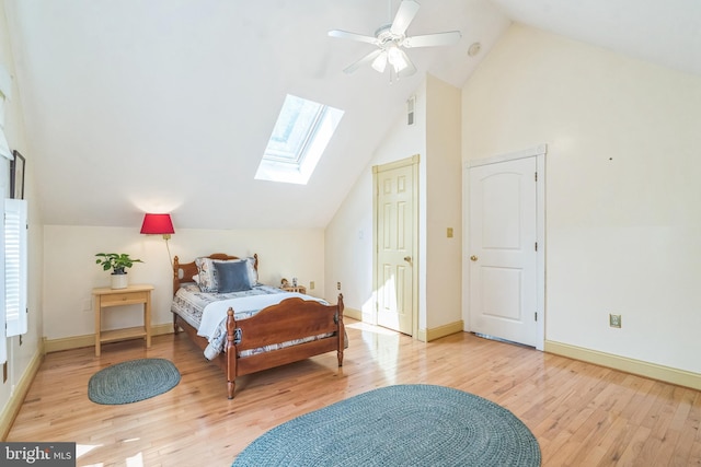 580 Buchanon Rd, Honey Brook, PA 19344 - bedroom featuring a skylight, lofted ceiling, wood finished floors, and a ceiling fan