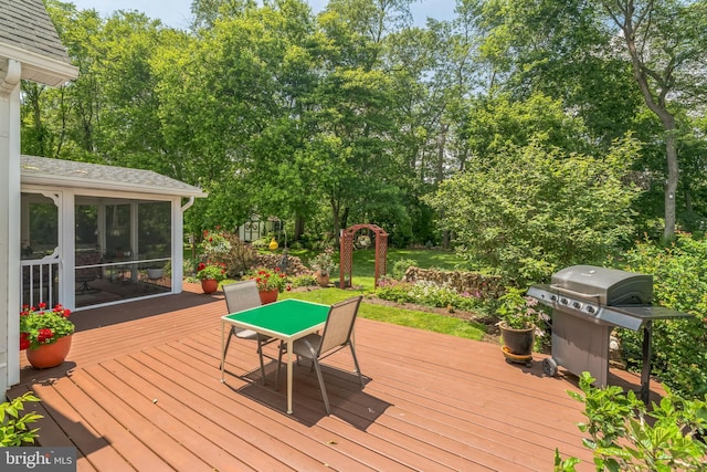 580 Buchanon Rd, Honey Brook, PA 19344 - wooden terrace with area for grilling, outdoor dining space, view of wooded area, and a sunroom