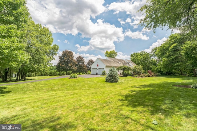 580 Buchanon Rd, Honey Brook, PA 19344 - view of green lawn with driveway and an attached garage