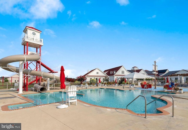 17723 Madaket Way, Lewes, DE 19958 - community pool featuring a water slide and a patio