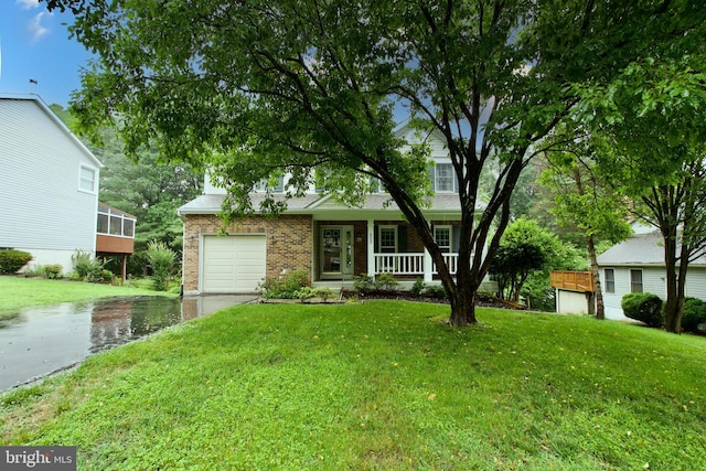 8225 Triple Crown Rd, Bowie, MD 20715 - view of front of home featuring covered porch, a front lawn, brick siding, and driveway