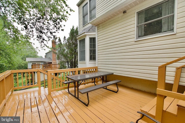 8225 Triple Crown Rd, Bowie, MD 20715 - wooden deck featuring outdoor dining area