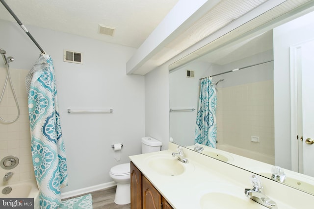8225 Triple Crown Rd, Bowie, MD 20715 - full bath featuring shower / bath combo, double vanity, and wood finished floors