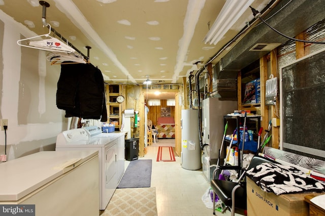 8225 Triple Crown Rd, Bowie, MD 20715 - laundry room with water heater, washing machine and clothes dryer, and light flooring
