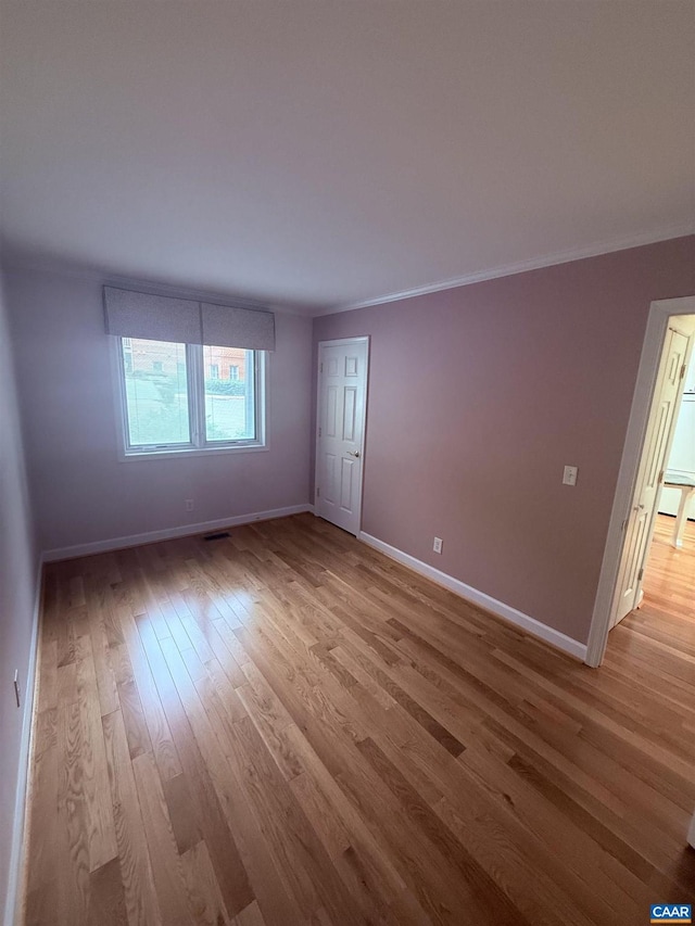 1303 Branchlands Dr, Charlottesville, VA 22901 - unfurnished room featuring light wood-style flooring and ornamental molding