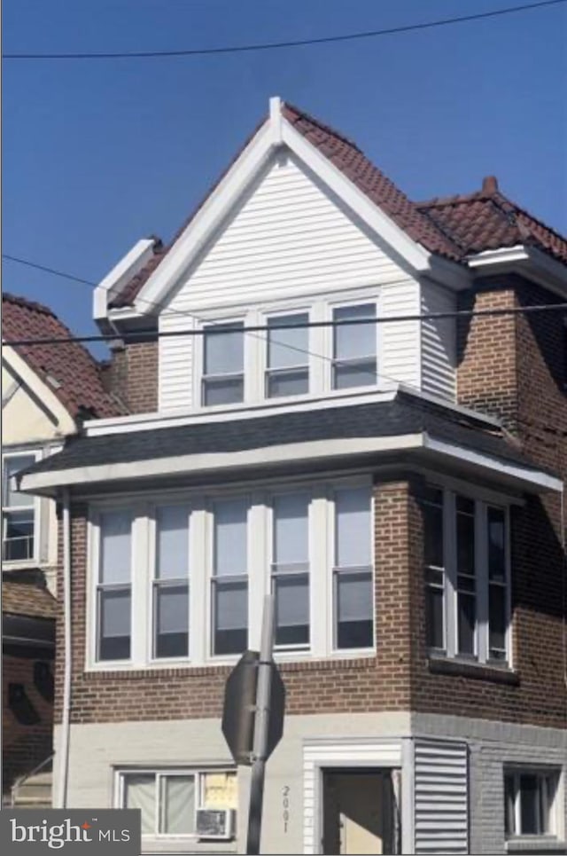 2001 N 52nd St, Philadelphia, PA 19131 - view of property exterior featuring brick siding