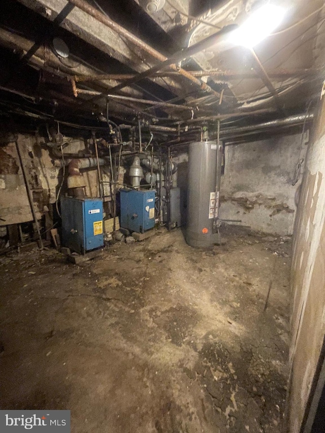 2001 N 52nd St, Philadelphia, PA 19131 - unfinished basement with water heater and a heating unit