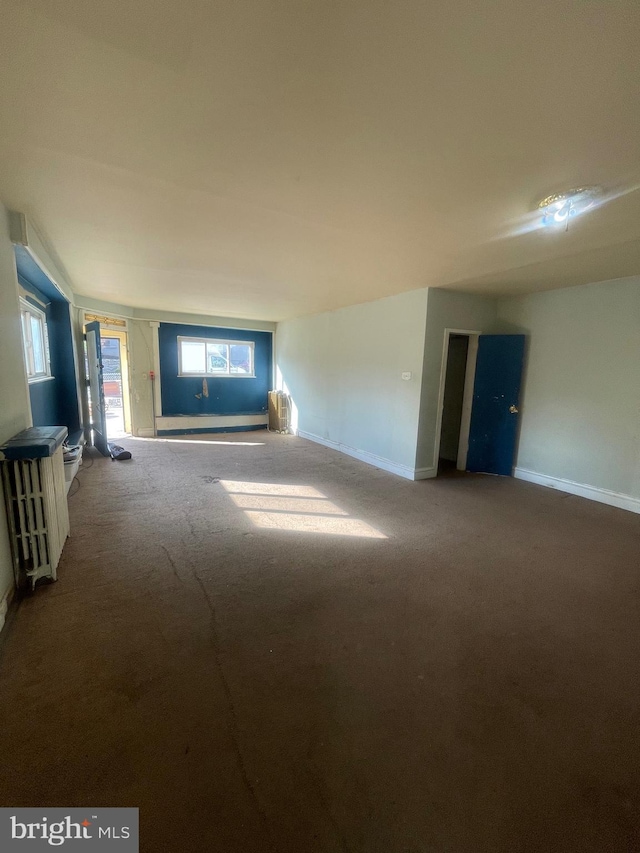 2001 N 52nd St, Philadelphia, PA 19131 - unfurnished living room featuring carpet floors and baseboards