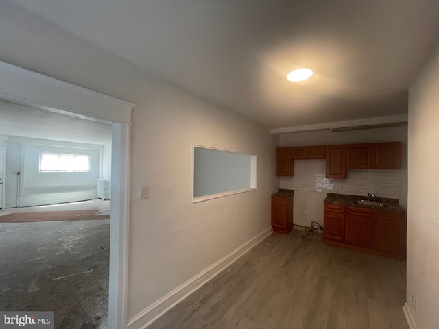 2001 N 52nd St, Philadelphia, PA 19131 - kitchen featuring light wood-style flooring and dark countertops