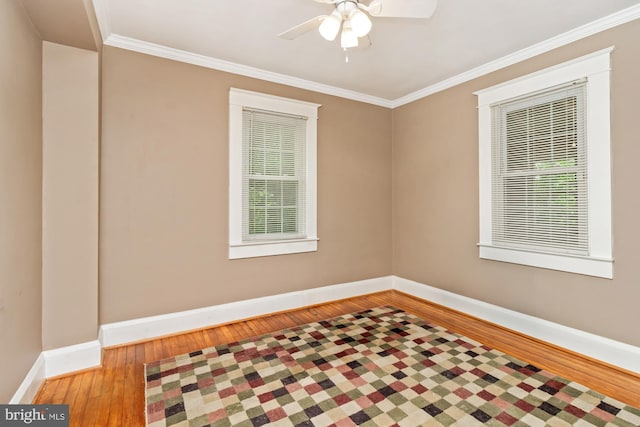 5100 Eugene Ave, Baltimore, MD 21206 - empty room with hardwood / wood-style flooring, a ceiling fan, ornamental molding, and healthy amount of natural light