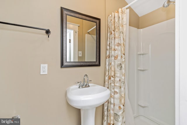 5100 Eugene Ave, Baltimore, MD 21206 - bathroom featuring a shower with shower curtain and a sink