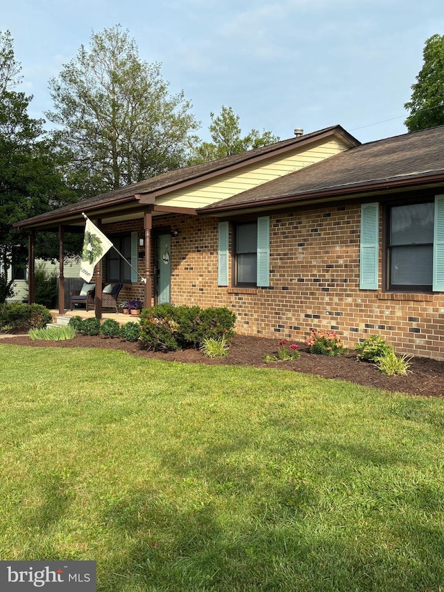 817 Maple Ave, Waynesboro, VA 22980 - view of front facade with a front lawn, brick siding, and roof with shingles