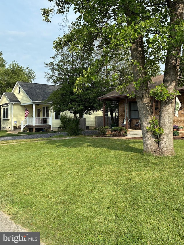 817 Maple Ave, Waynesboro, VA 22980 - view of front of home with brick siding and roof with shingles