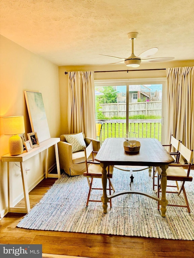 817 Maple Ave, Waynesboro, VA 22980 - dining area with a textured ceiling, ceiling fan, and wood finished floors