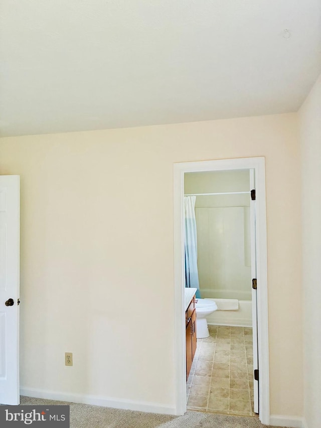 817 Maple Ave, Waynesboro, VA 22980 - unfurnished bedroom featuring baseboards and ensuite bathroom