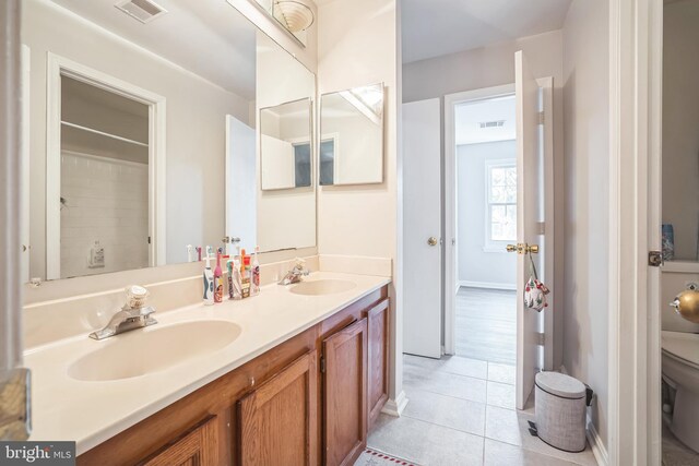 15198 Wentwood Ln, Woodbridge, VA 22191 - full bathroom with double vanity and tile patterned flooring