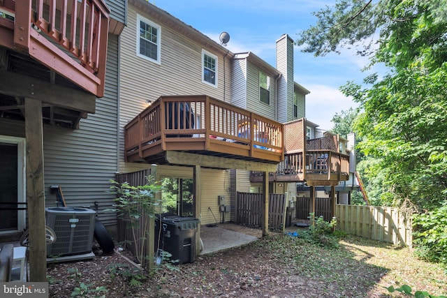 15198 Wentwood Ln, Woodbridge, VA 22191 - back of property with a chimney and a deck