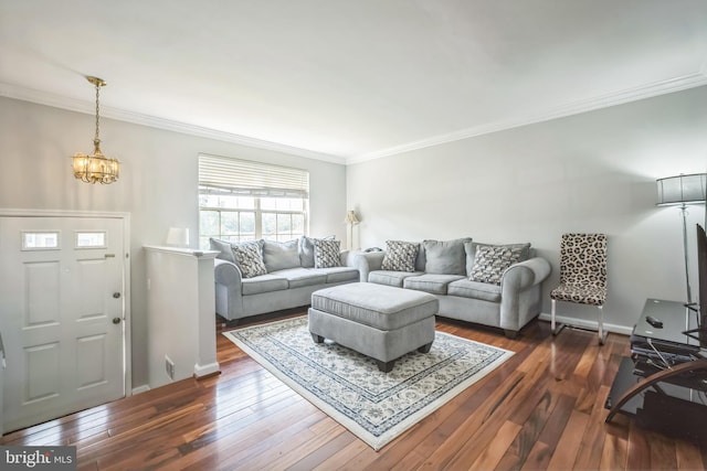 15198 Wentwood Ln, Woodbridge, VA 22191 - living area with a chandelier, ornamental molding, and dark wood finished floors