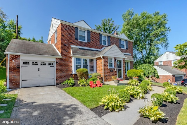 1626 Rose Glen Rd, Havertown, PA 19083 - view of front of property featuring brick siding, a garage, driveway, and a chimney