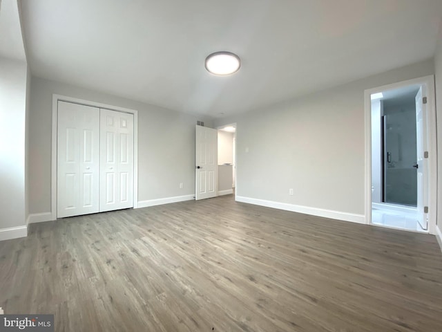 1319 Rainer Rd, Brookhaven, PA 19015 - unfurnished bedroom with wood finished floors, a closet, and ensuite bathroom