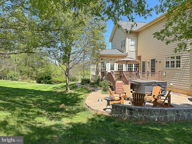 12773 Beebe Ct, Lovettsville, VA 20180 - view of green lawn with a hot tub, a patio, and a wooden deck