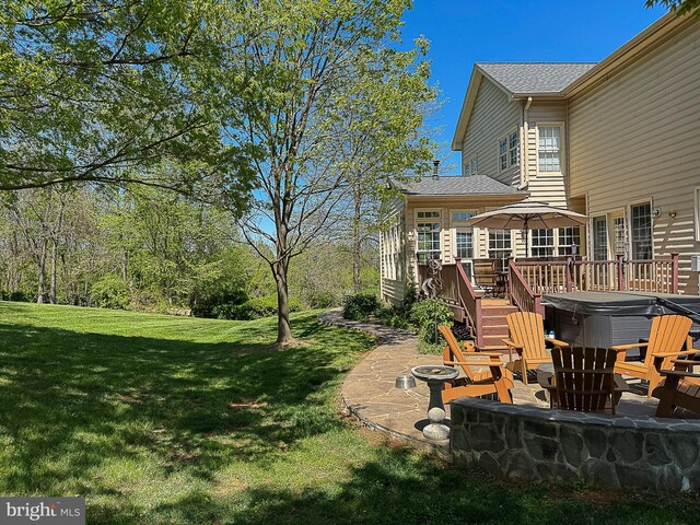 12773 Beebe Ct, Lovettsville, VA 20180 - view of grassy yard with a hot tub, a deck, and a patio area