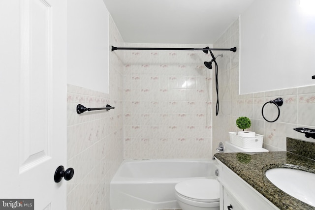 13727 Mahoney Dr, Woodbridge, VA 22193 - full bath with tile walls, vanity, and bathtub / shower combination