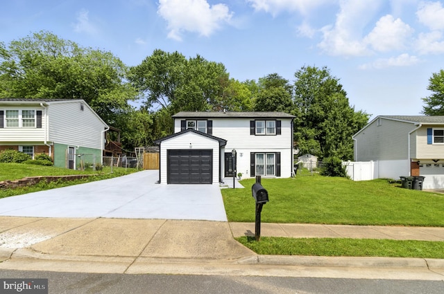 13727 Mahoney Dr, Woodbridge, VA 22193 - view of front of property with concrete driveway and a garage