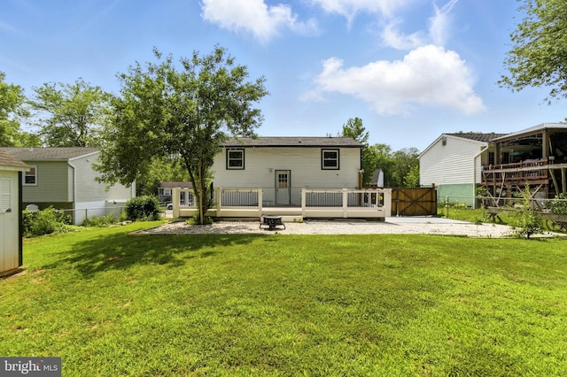 13727 Mahoney Dr, Woodbridge, VA 22193 - rear view of house featuring a gate and a wooden deck
