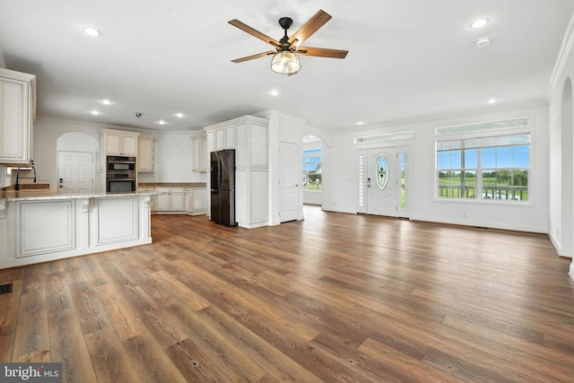 9936 Bell Wood Farm Ln, Nokesville, VA 20181 - kitchen featuring freestanding refrigerator, ornamental molding, open floor plan, a ceiling fan, and dark wood-style floors
