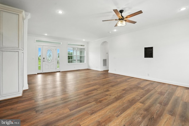 9936 Bell Wood Farm Ln, Nokesville, VA 20181 - unfurnished living room featuring crown molding, arched walkways, a ceiling fan, wood finished floors, and recessed lighting