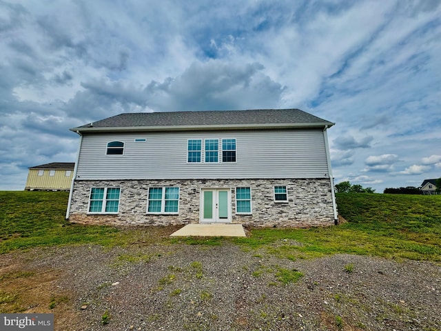 9936 Bell Wood Farm Ln, Nokesville, VA 20181 - back of house featuring french doors, stone siding, and a patio