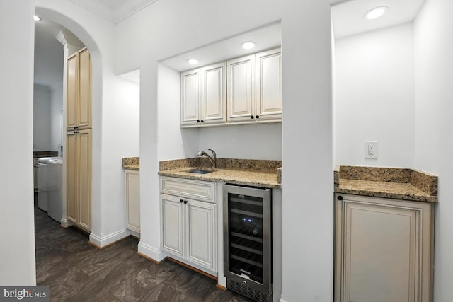 9936 Bell Wood Farm Ln, Nokesville, VA 20181 - indoor wet bar with beverage cooler, ornamental molding, arched walkways, and recessed lighting