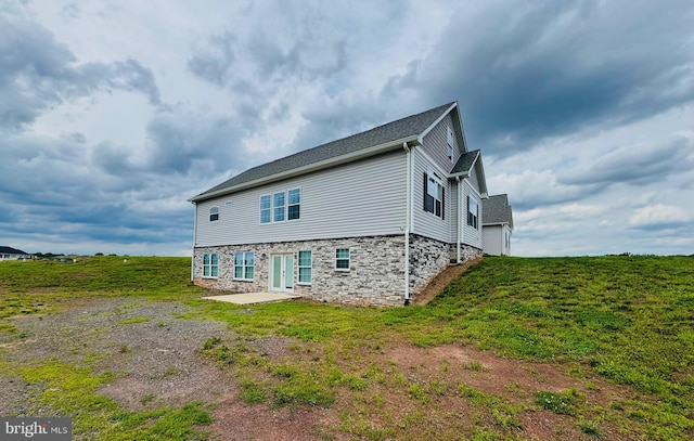 9936 Bell Wood Farm Ln, Nokesville, VA 20181 - back of house featuring stone siding and a patio area