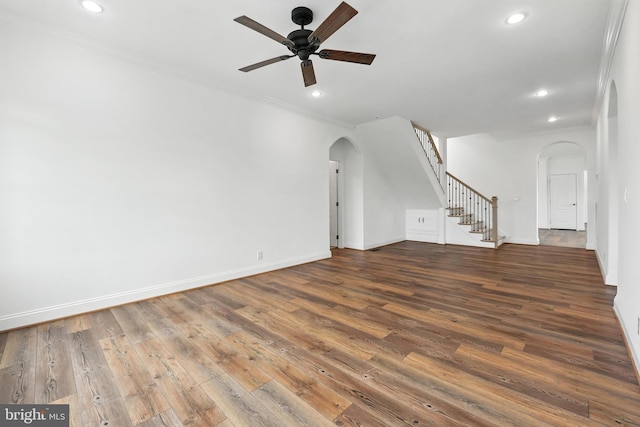 9936 Bell Wood Farm Ln, Nokesville, VA 20181 - unfurnished living room featuring arched walkways, crown molding, stairs, ceiling fan, and recessed lighting