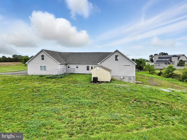 9936 Bell Wood Farm Ln, Nokesville, VA 20181 - rear view of house with a shed and a lawn