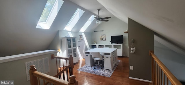 11492 Corinthia Ct, Woodbridge, VA 22192 - dining room with a skylight, dark wood-style floors, lofted ceiling, a ceiling fan, and a desk