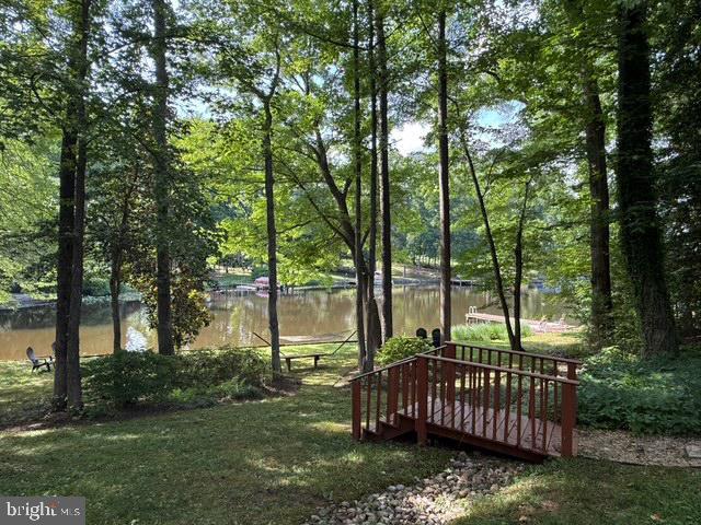210 Lake Caroline Dr, Ruther Glen, VA 22546 - surrounding community featuring a water view