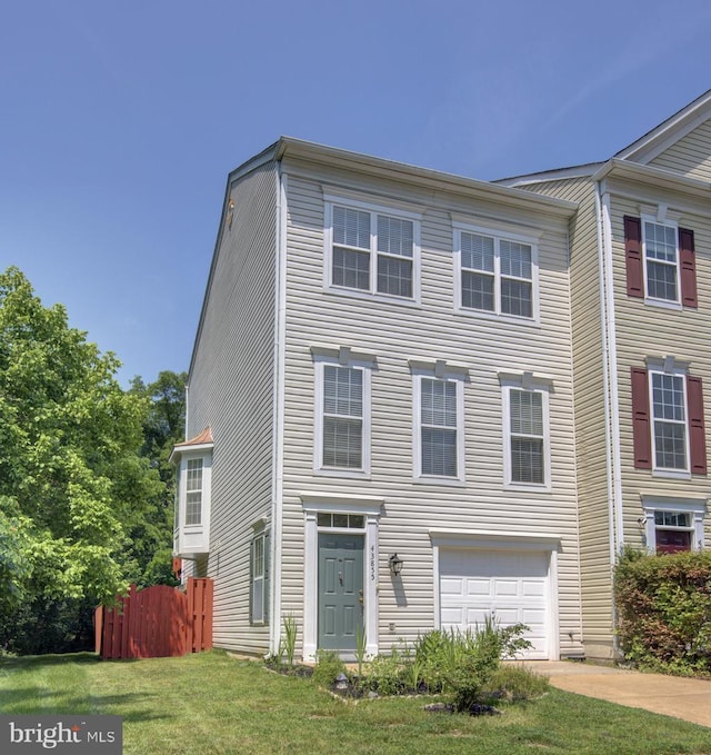 43855 Tattinger Ter, Ashburn, VA 20148 - view of front facade with a garage and concrete driveway