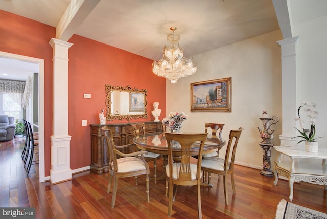 43855 Tattinger Ter, Ashburn, VA 20148 - dining room with decorative columns, hardwood / wood-style floors, and a chandelier
